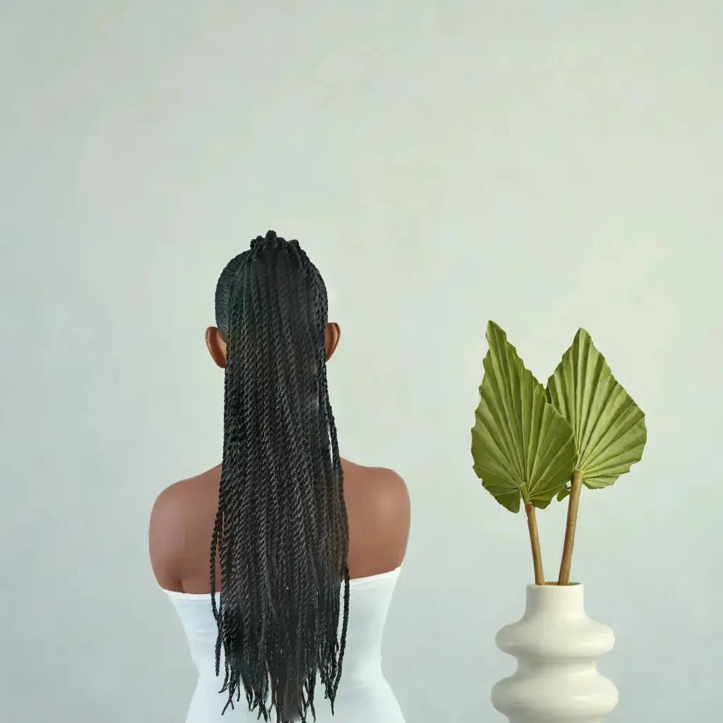 Postiche queue de cheval avec élastique pour femme noire – vanille twist chic et naturelle, pratique et facile à poser.