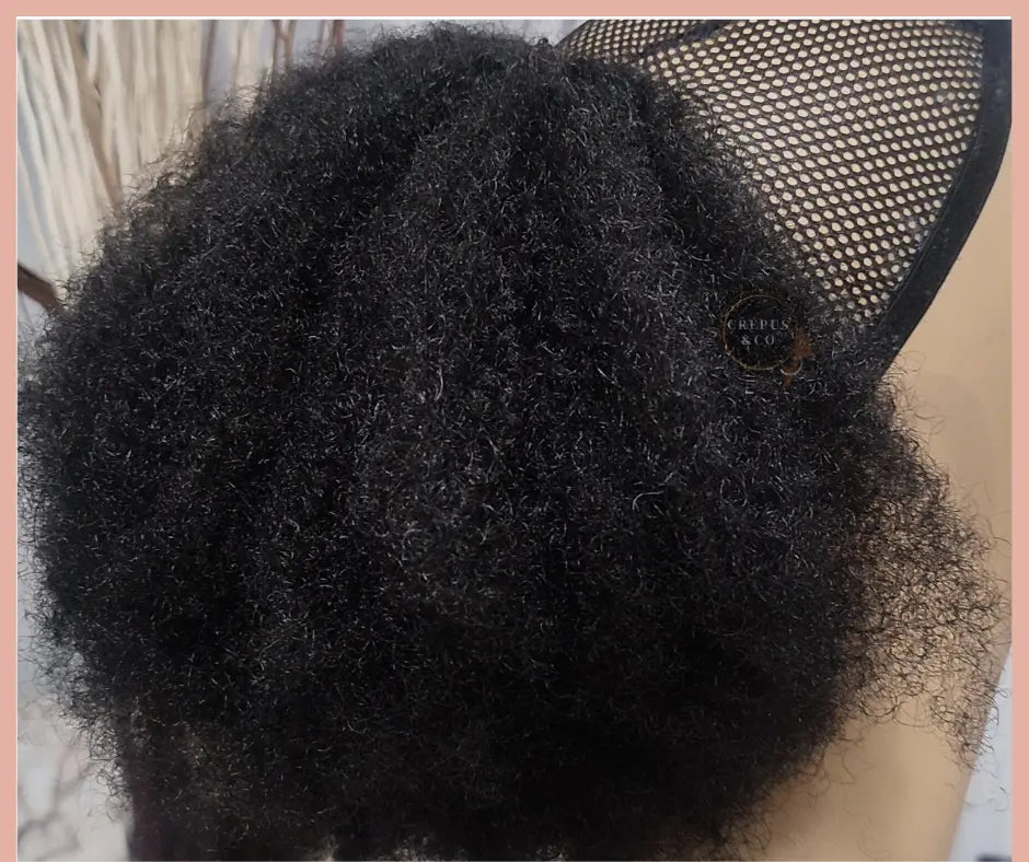 Postiche queue de cheval afro pour femmes africaines – Cheveux crépus naturels, frisés ou nappy. Mèche ponytail avec élastique, idéale pour une coiffure afro rapide. Prothèse capillaire et perruque synthétique pour une coiffure pratique et élégante.