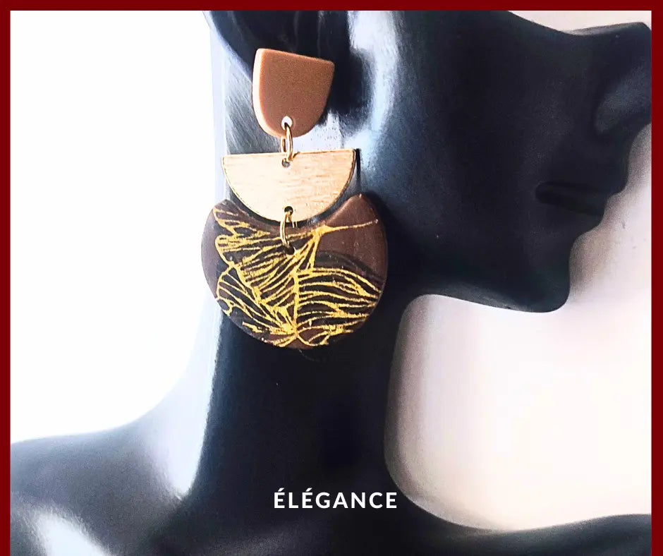 Boucles d’oreilles en argile polymère avec motif de feuille de ginkgo, légères et originales, signées Élégance Bijoux.