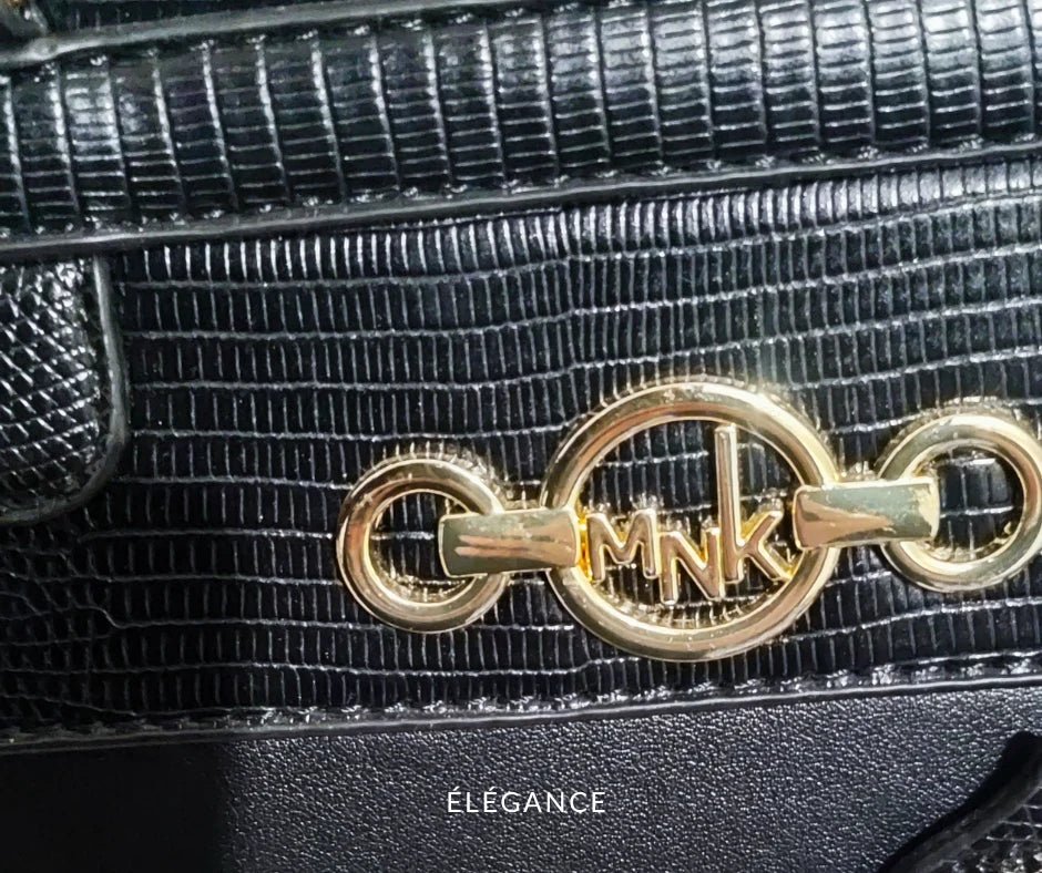 Détail logo doré Manoukian sur sac noir structuré