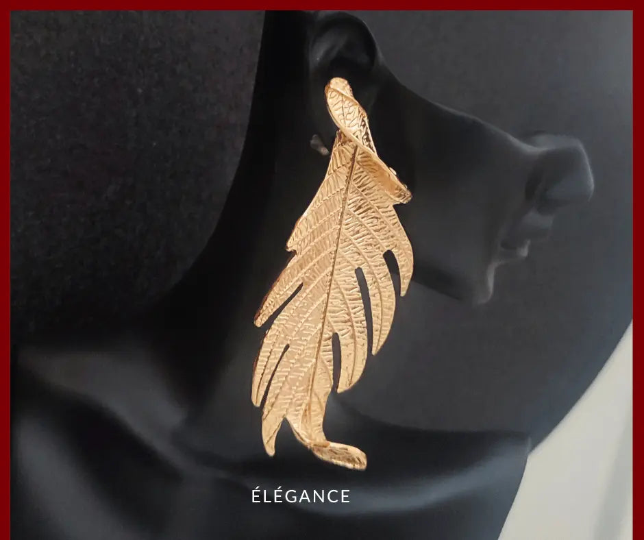 boucles d'oreilles originales, boucles d'oreilles feuille, bijou femme, boucles d'oreilles dorées, boucles d'oreilles tendance, boucle d'oreille pendantes, boucles d'oreille légères, boucles d'oreilles xxl, élégance bijoux, tendance bijoux femme, bijoux tendances femme, boutique bijoux, les bijoux, acheter bijoux, site bijou, boucles d'oreilles tendance, vente bijoux