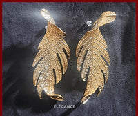 boucles d'oreilles originales, boucles d'oreilles feuille, bijou femme, boucles d'oreilles dorées, boucles d'oreilles tendance, boucle d'oreille pendantes, boucles d'oreille légères, boucles d'oreilles xxl, élégance bijoux