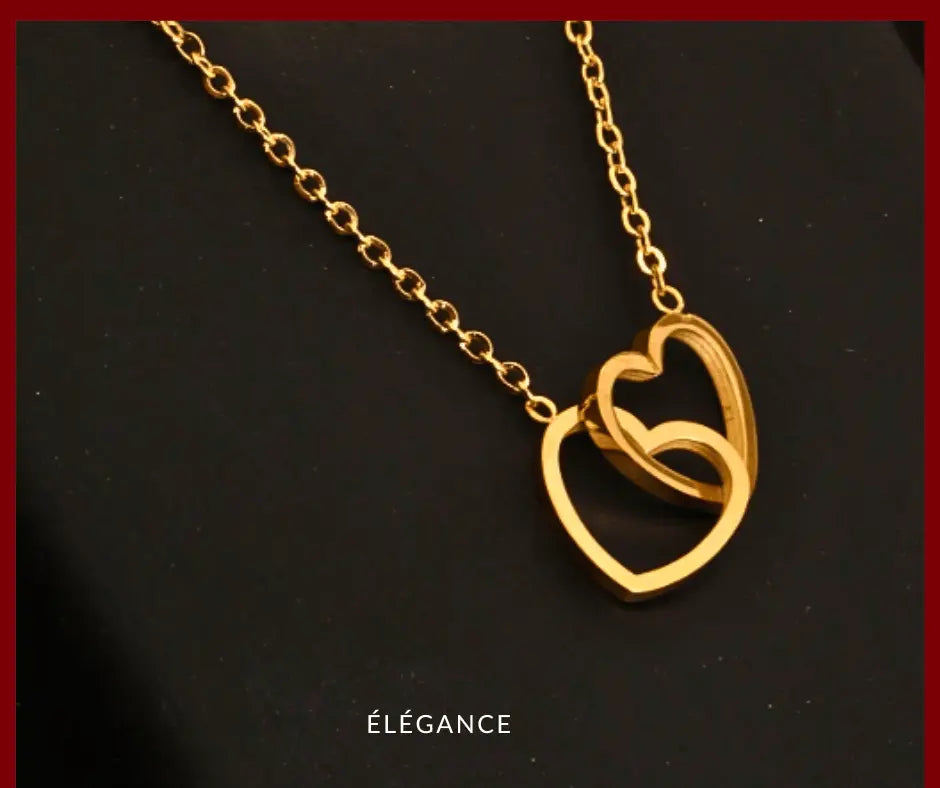 Collier délicat en acier inoxydable doré avec pendentif double cœur, idéal pour célébrer l'amour à la Saint-Valentin.