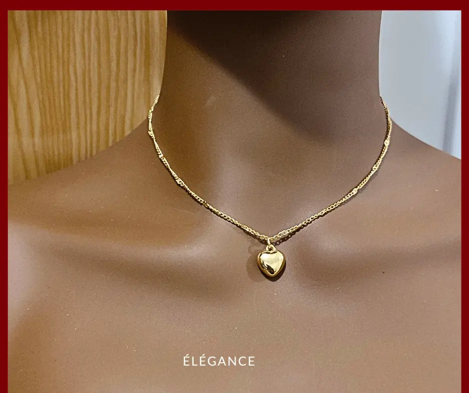 Collier cœur en acier inoxydable doré, accessoire romantique et intemporel pour femme.