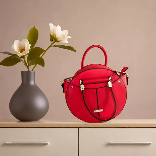 sac rond sac à main rouge sac Gérard Pasquier sac à main élégant sac à main chic sac à main tendance sac avec bandoulière sac à main mode sac rond avec anses sac à main compact elegance sacs