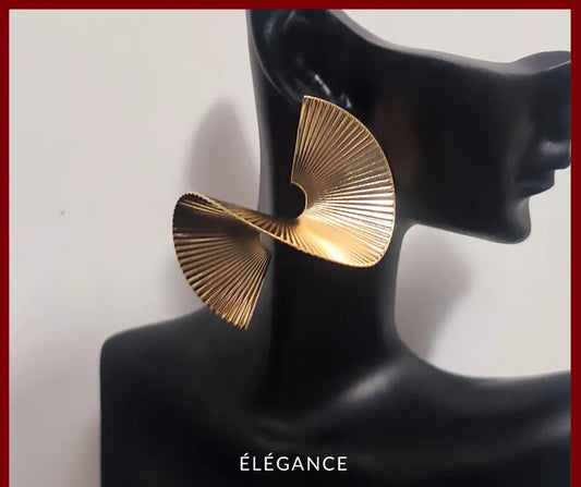 Boucles d’oreilles spirale dorées oversize – Élégantes et originales