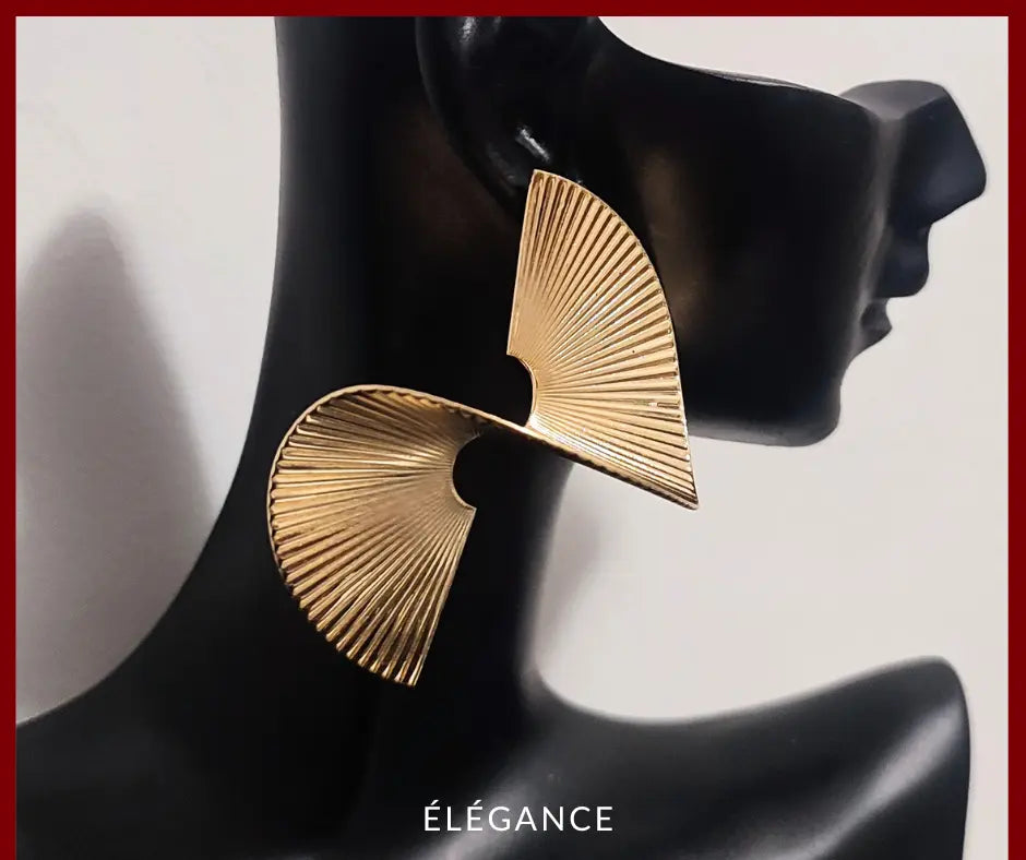 Boucles d'oreilles créoles spirale dorées oversize – Élégance Simplement, bijoux tendance pas chers pour femme, accessoires mode incontournables