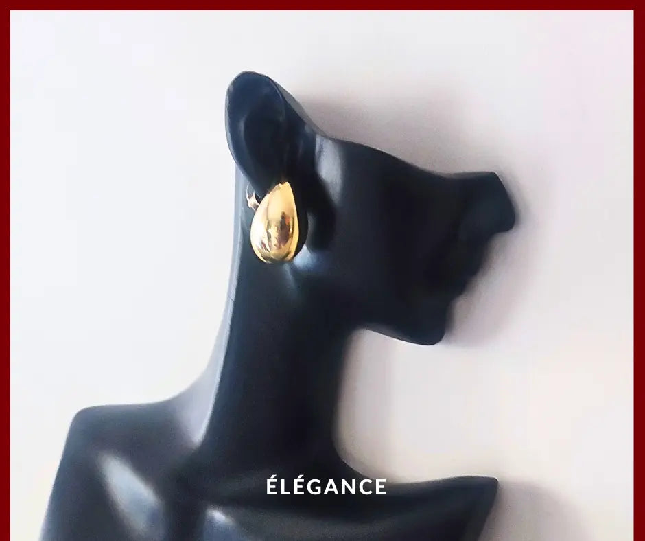 Boucles d’oreilles longues en forme de goutte d’eau, en acier inoxydable, style élégant et féminin.