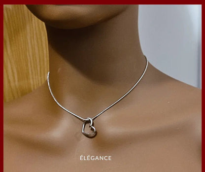 Collier en acier inoxydable argenté avec breloque en cœur creux elegance bijoux
