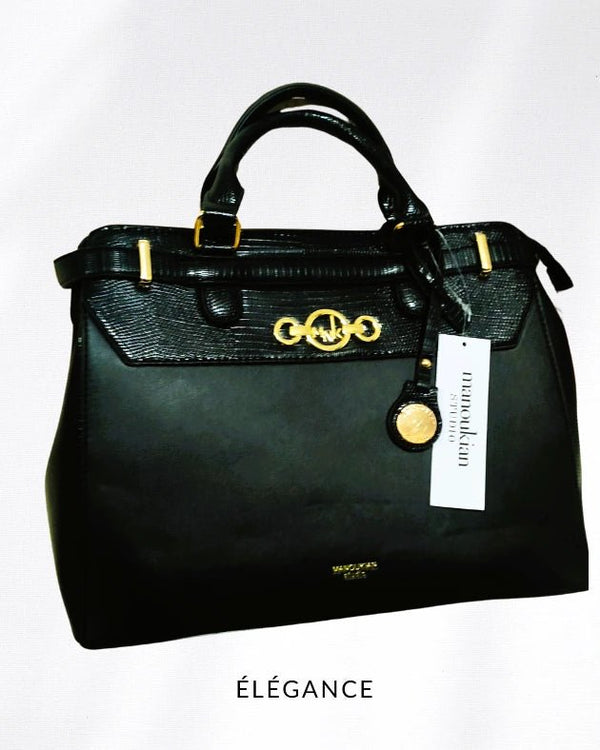 Sac Manoukian Jorry noir porté main avec anses rigides