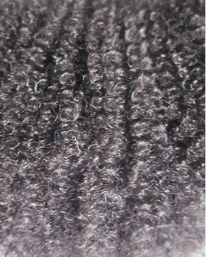 Zoom macro sur la fibre semi-naturelle frisée haute définition type 3C-4A. Crépus and Co